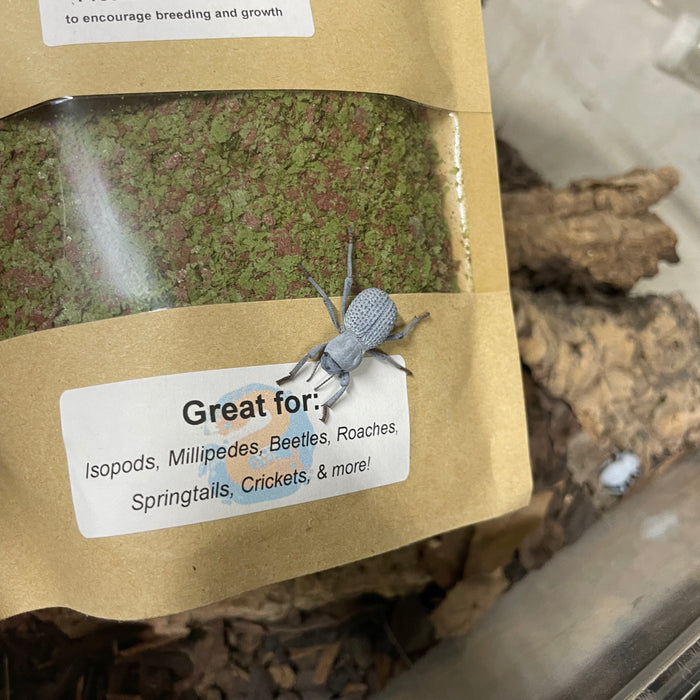 Photo of the label on the arthropod food bag indicating that it is great for Isopods, Millipedes, Beetles, Roaches, Springtails, Crickets, and more. There is a Blue Death Feigning Beetle in the photo.